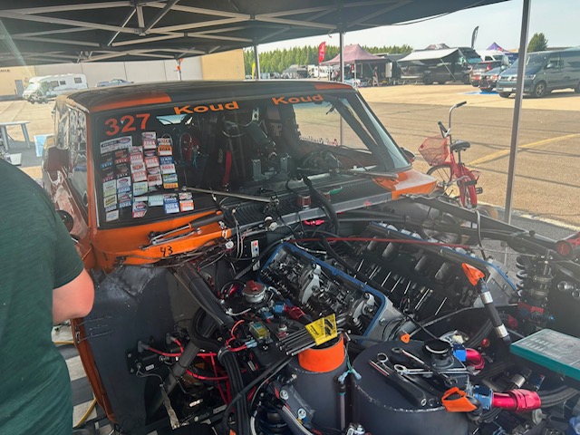 Engine open in the pits, hunting for the fault