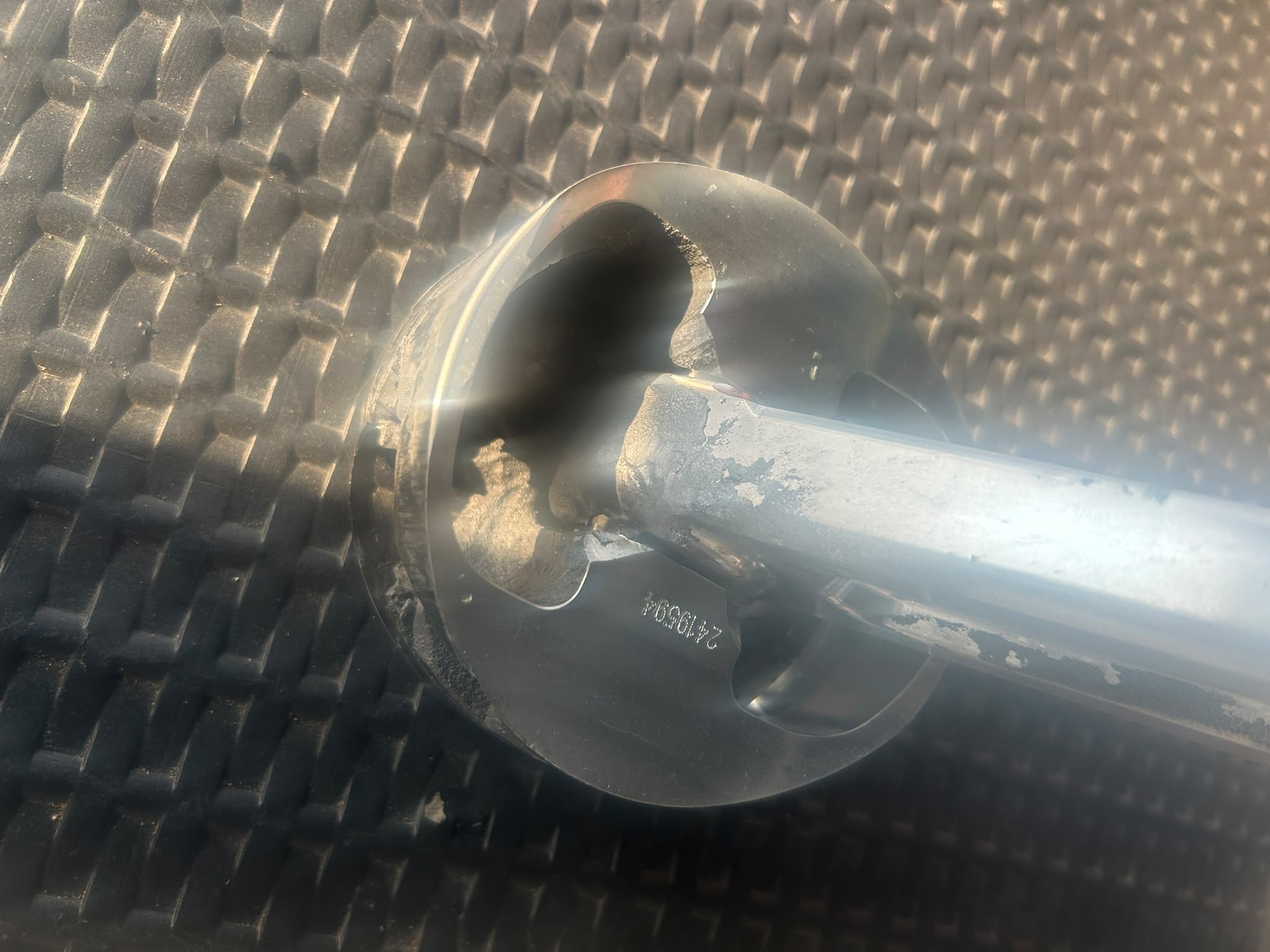 The underside of the piston and the pin bore, melted